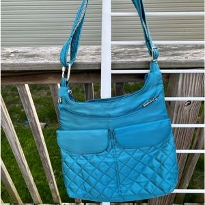 Pretty teal travel bag.